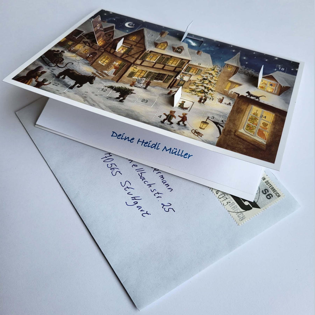Calendario de Adviento de postales "Nochebuena en el pueblo"